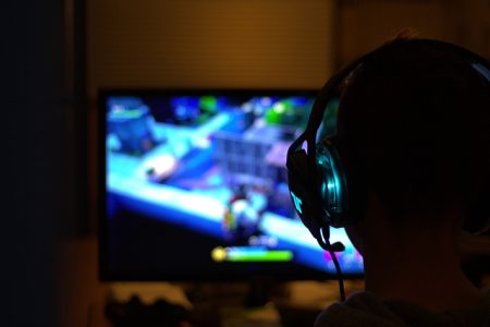 Ways to Enhance Your Gaming Experience gamer playing video game